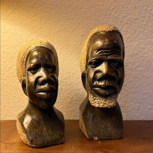 Pair of African soapstone, or serpentine Shona male, and female hand carved bust